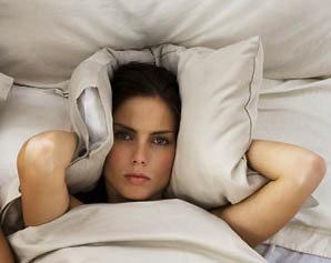 woman laying on bed