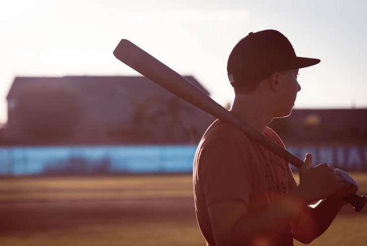 kid holding bat